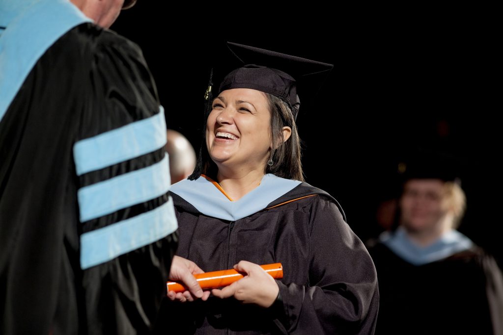 A graduate student receives her degree during the spring 2015 commencement at the University of Tennessee at Martin.