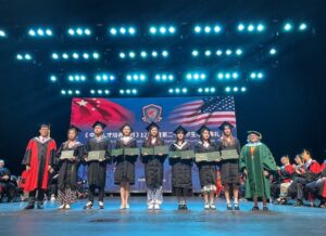 Chinese students receiving their diplomas.