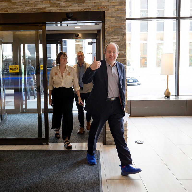 Colorado Governor Jared Polis arrives at ASM 2024 in Denver. Photo Credit: Sara Hertwig for AASCU 