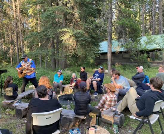 2025 SOPL cohort listen to Jack Gladstone, “Montana’s Troubadour” and co-­founder of Glacier National Park’s renowned lecture series, “Native America Speaks.”