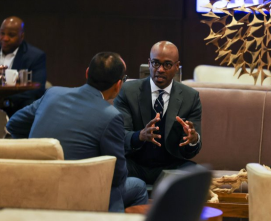 Chancellor Jomes T. Minor of Southern Illinois University-Edwardsville exchanges ideas in between sessions.