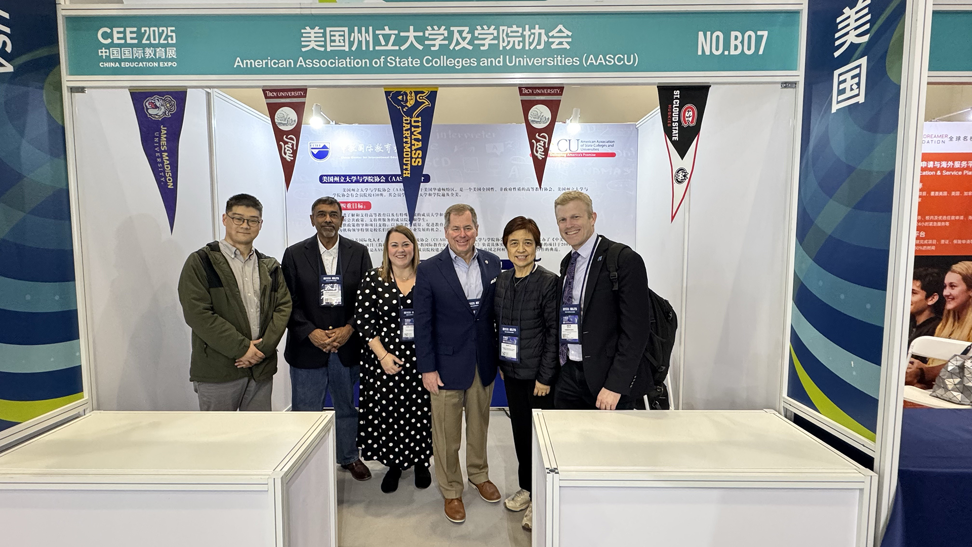 Delegates at AASCU's booth in the expo hall at the 2025 conference.